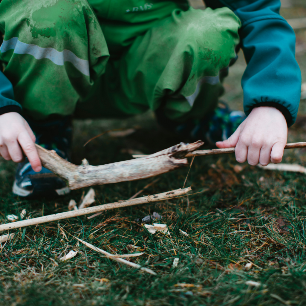 Kids enjoying screen free nature activities outdoors in the garden